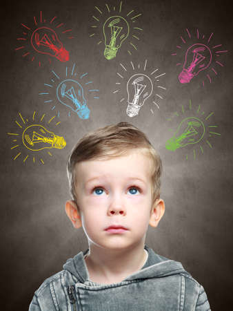 Children idea with draft lamp, boy came up with ideaの写真素材