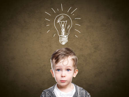 Children idea with draft lamp, boy came up with ideaの写真素材