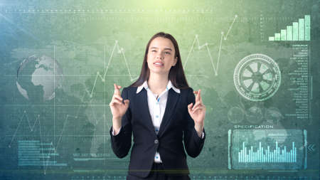 Beautiful longhair businesswoman with crossed fingers, isolated studio background with copyspace