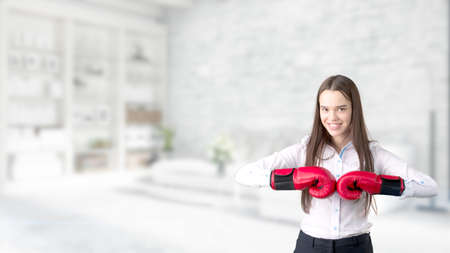 Young Business woman over interior backgroundの写真素材