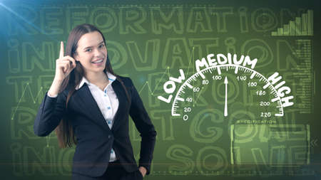 Beauty businesswoman on painted background with marketing words. Advertising, investment and business plan conceptの写真素材