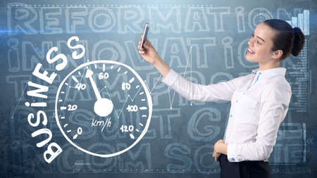 Beauty businesswoman on painted background with marketing words. Advertising, investment and business plan conceptの写真素材