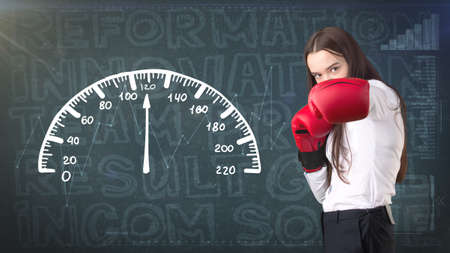 Beauty businesswoman on painted background with marketing words. Advertising, investment and business plan conceptの写真素材