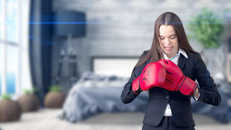 Young beautiful business woman and creative designer standing over blured interior background