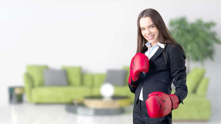 Young Business woman over interior backgroundの写真素材