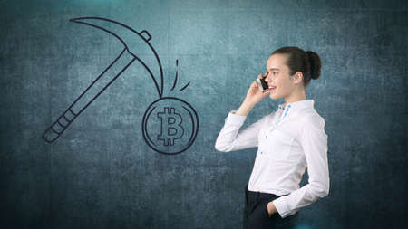 Lucky cute lady and bitcoin investment. Concept of mining and virtual criptocurrency. Successful...