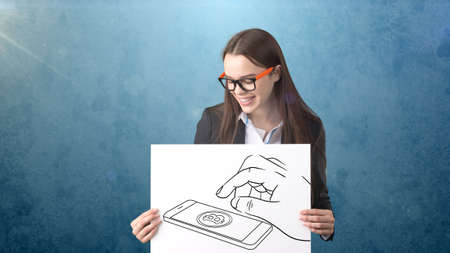 Beauty business woman standing near btc. Successful Bitcoin investment. Concept of virtual criptocurrency.の写真素材