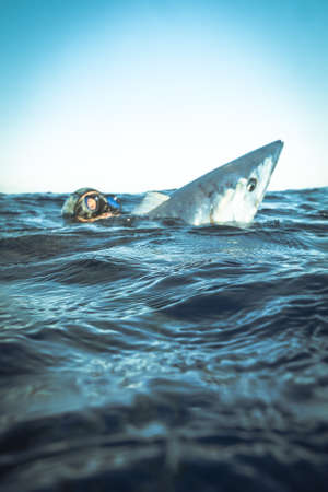 A spear fisherman with a prized wahoo