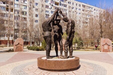 Monument to Soldiers of the USSR fought in Afghanistan" on the background of the granite memorial slabs, died voenoslujashim in the performance of international debt in Afghanistan, located in Traktorozavodsky area, in the Park of Memory, Volgograd, Russiのeditorial素材