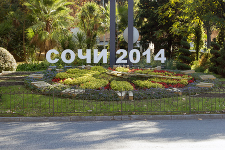 SOCHI, RUSSIA - November 06, 2015: A flower bed in a sunny day in the center an inscription of the city of Sochi 2014. Sochi, Russiaのeditorial素材