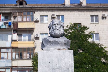VOLGOGRAD, RUSSIA - June 11, 2016: A monument the head Karl Marx in the yard of the house. Volgograd, Russiaのeditorial素材