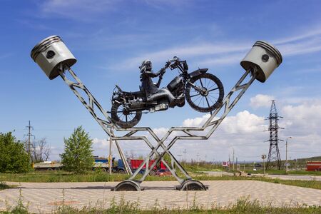 VOLGOGRAD, RUSSIA - May 04, 2016: A monument to the biker known as the Bird, against the blue sky. Pokryshkin Street, Volgograd, Russiaのeditorial素材