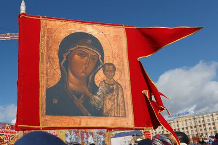 VOLGOGRAD, RUSSIA - February 26, 2017: A red flag with the image of Christian symbols, sacred on the...