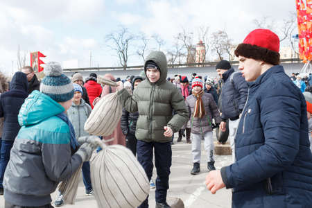 VOLGOGRAD, RUSSIA - February 26, 2017: Maslenitsa holiday, festivities and entertainments on the area of the fallen Fightersのeditorial素材