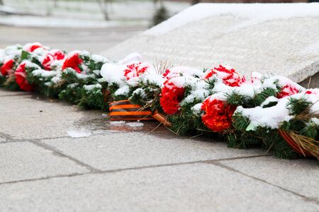 VOLGOGRAD, RUSSIA - March 22, 2017: A sepulchral wreath before a monument to Mikhail Panikakhe in the city of Volgogradのeditorial素材