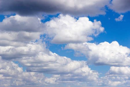 The blue sky with white clouds in clear summer day