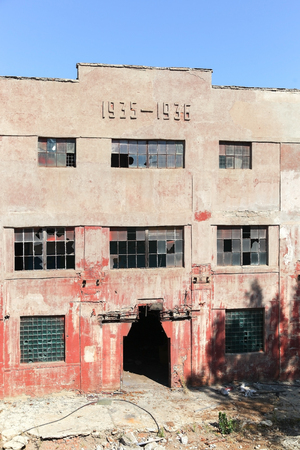 VOLGOGRAD, RUSSIA - July 5, 2017: Window frames in a wall old thrown brick the building outside のeditorial素材