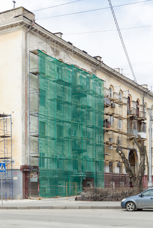 VOLGOGRAD, RUSSIA - April 07, 2018: Reconstruction and repair of the old Soviet houseのeditorial素材