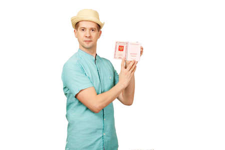 The Caucasian man shows the opened international passport