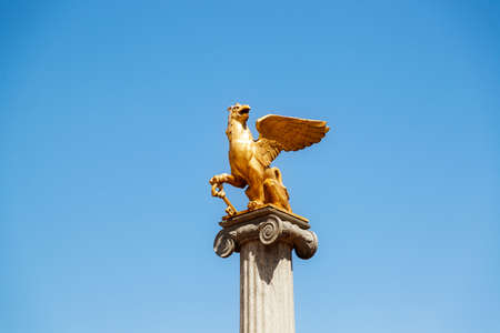 KERCH, RUSSIA - June 29, 2019: Symbol of the city of Kerch. Stela with Golden Griffin on Taurus Square, Crimeaのeditorial素材
