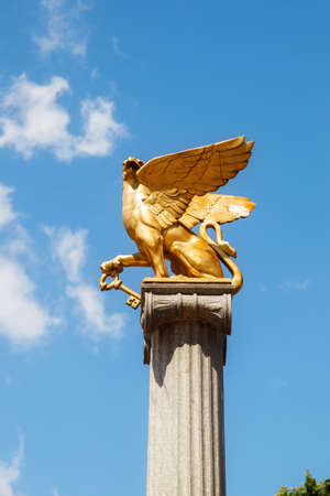 KERCH, RUSSIA - June 29, 2019: Symbol of the city of Kerch. Stele with a Golden Griffin on Tavricheskaya Square, Crimea. Close upのeditorial素材