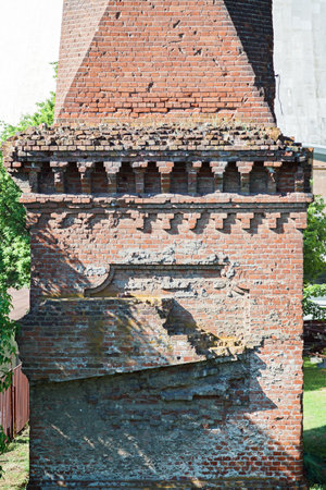 VOLGOGRAD, RUSSIA - 27 April, 2019: a detail of an old pipe from a red brick in the museum-zapavedke Stalnigradsky fight, Volgogradのeditorial素材