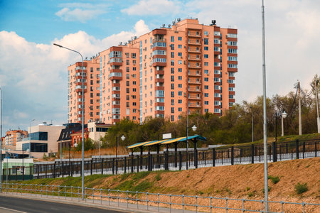 VOLGOGRAD, RUSSIA - April 27, 2019: a multi-storey whole house near the road in the city of Volgogradのeditorial素材
