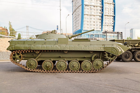 VOLGOGRAD, RUSSIA - 27 April, 2019: fighting Soviet tank and housing complex Volga sails. A look with a sideのeditorial素材