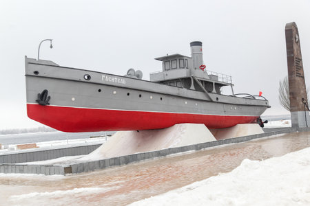 VOLGOGRAD, RUSSIA - 16 January, 2019: The Quencher ship on the central embankment in the city of Volgograd in the winter. Monument to river transport workers and firemen to defenders of Tsaritsynoのeditorial素材