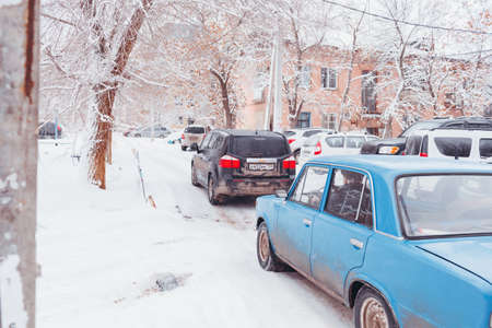 VOLGOGRAD, RUSSIA - 22 December, 2018: Difficulties of the movement of cars on the asphalted city road in the winter during snow. A look from the first personのeditorial素材