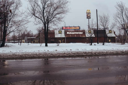 VOLGOGRAD, RUSSIA - 27 December, 2018: Zimnyaya Highway along McDonald's in the evening
