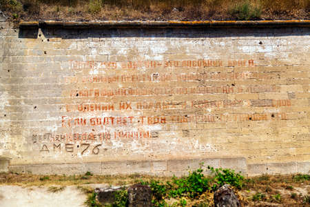 KERCH, RUSSIA - July 4, 2019: Red inscription on the wall in the fortress of Kerch. Kerch, Crimeaのeditorial素材
