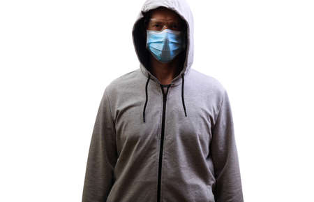 Sports man in hooded jacket, protective glasses, looking into camera, isolate, white