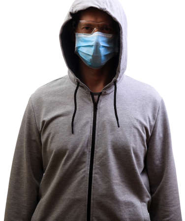 Sports man in hooded jacket, protective glasses, looking into camera, isolate, whiteの写真素材