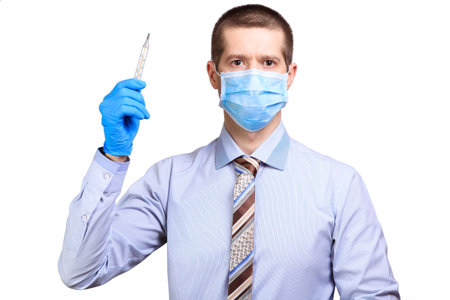 Man wearing rubber gloves, medical mask on his face, shows on a degree bar, isolated, whiteの写真素材