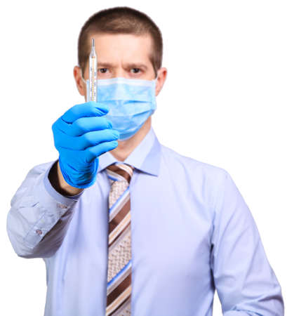 Man wearing rubber gloves, medical mask on his face, shows on a degree bar, isolated, whiteの写真素材
