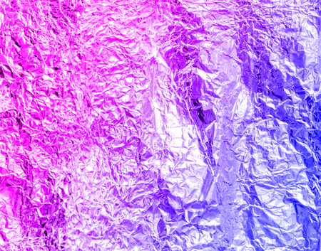 Purple and blue foil abstract background in trending neon colors.の写真素材