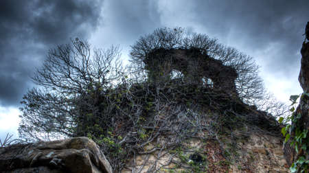 An old abandoned hermitage with a frightening lookの写真素材