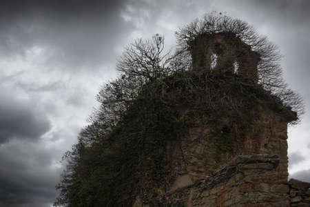 An old abandoned hermitage with a frightening lookの写真素材