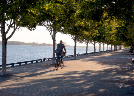 Toronto, Ontario / Canada - Oct. 01, 2015: Riding bicycle in the public parkのeditorial素材