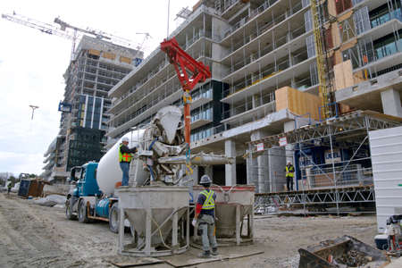 Toronto, Ontario / Canada - 01/28/2022: Building construction site with crane and concrete...
