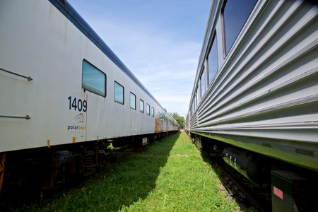 Diminishing perspective view of the train parked on the Uxbridge Railroad Station.