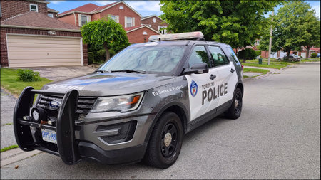 Toronto, Ontario / Canada - June 13, 2022:  Police patrol vehicle was parking on the the residential area, Toronto, Ontario, Canadaのeditorial素材
