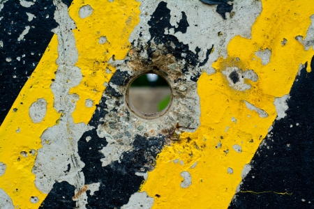 Grunge traffic signal yellow with black stripes - abstract textureの写真素材
