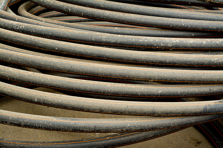 Dusty and dirty PVC pipe into the ground before layingの写真素材