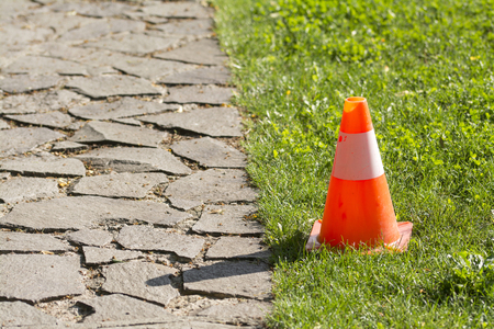 Traffic cone in the park near the promenadeの写真素材