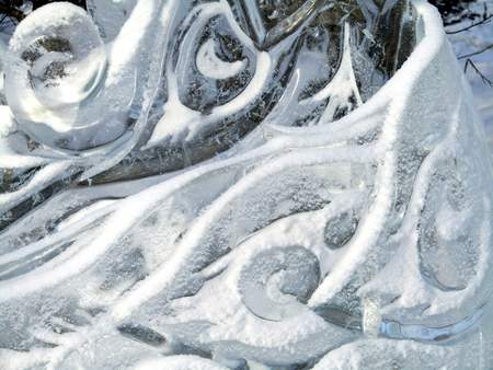 Transparent ice sculpture, the texture of the feathersの写真素材