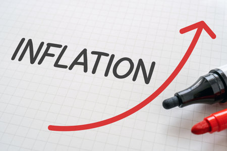 White paper written "INFLATION" with markers.の写真素材
