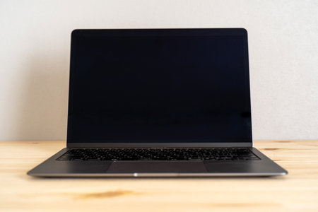 A laptop pc and the table.