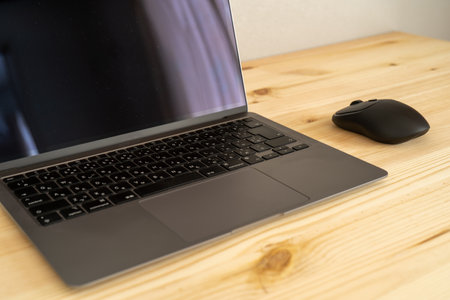 A laptop pc and a mouse.の写真素材